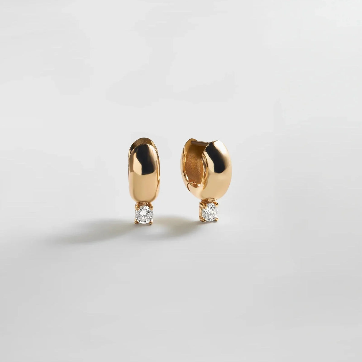 Kourtney Huggie Earrings - Kourtney Gold Plated Brass Earrings